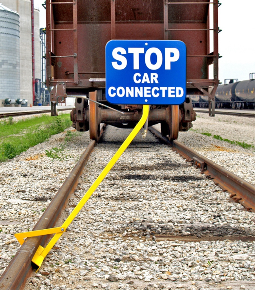 Clamp-on, non Locking - Steel Holder. Clamps to rail head. Sign plate not included.